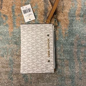 Michael Kors wristlet, new with tags